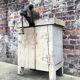 Vintage workbench with vice, old trade furniture