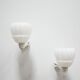 Pair of art deco porcelain and glass wall appliques