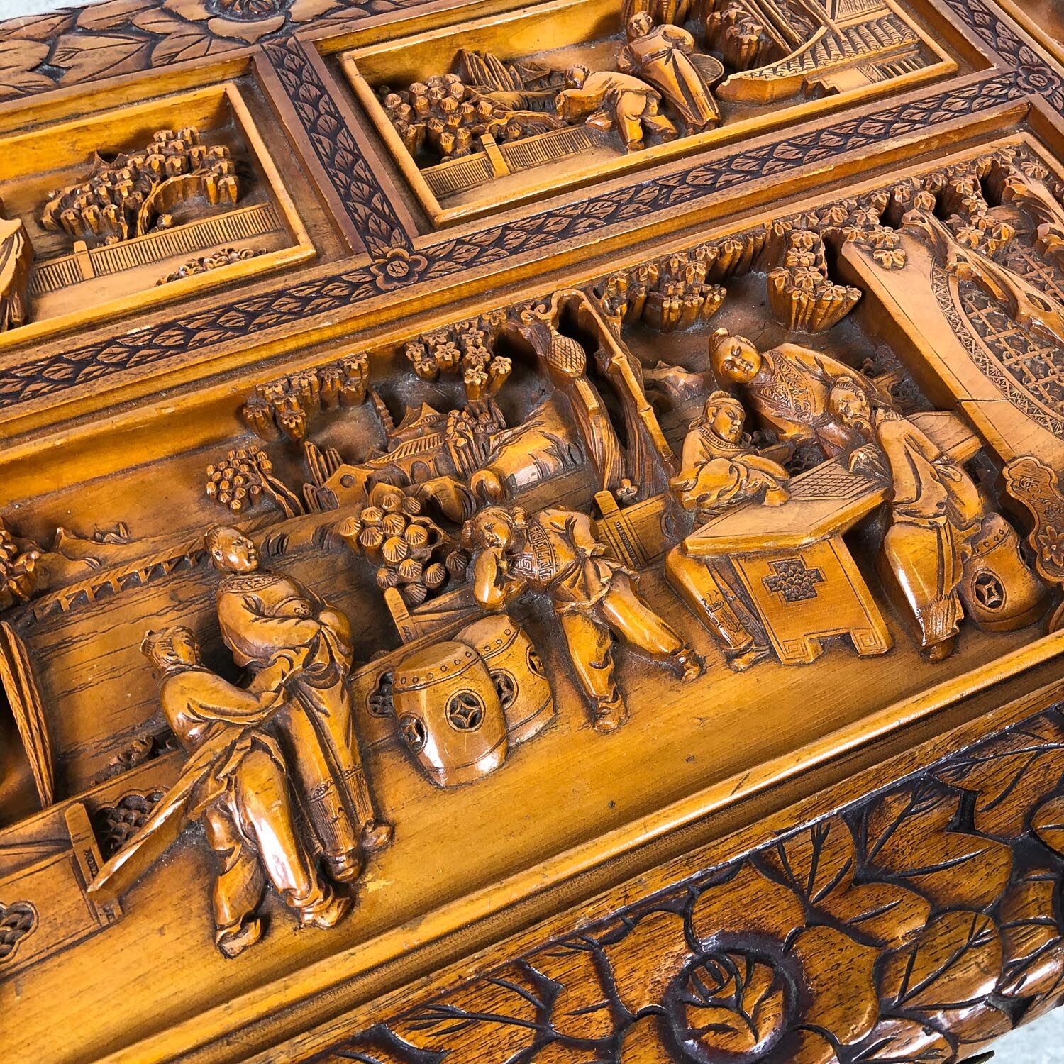 Vintage Chinese carved camphor wood chest on claw feet