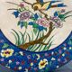 Large circular earthenware dish from Louvière with Longwy style bird decoration