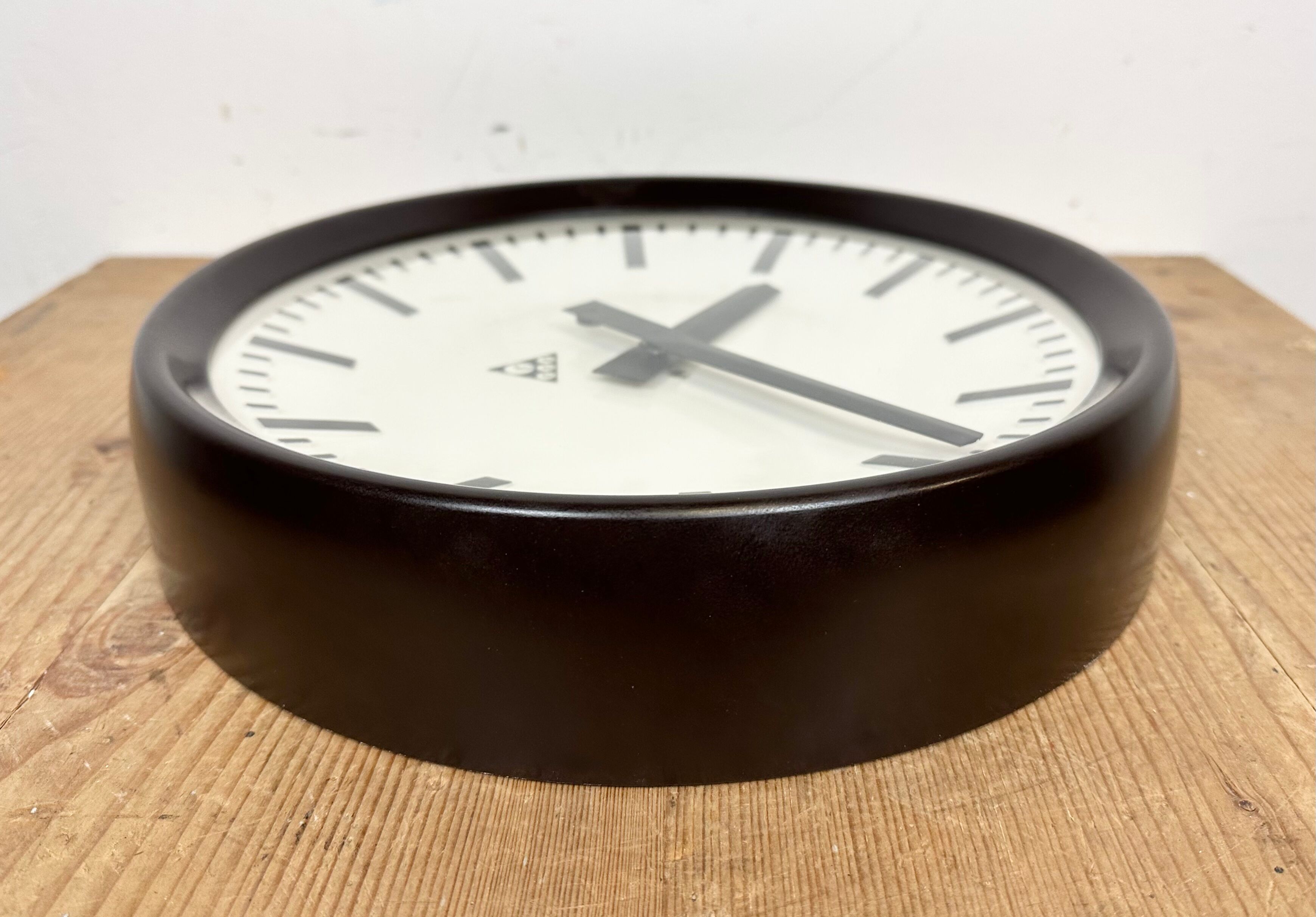 Industrial bakelite factory wall clock from Pragotron, 1960s