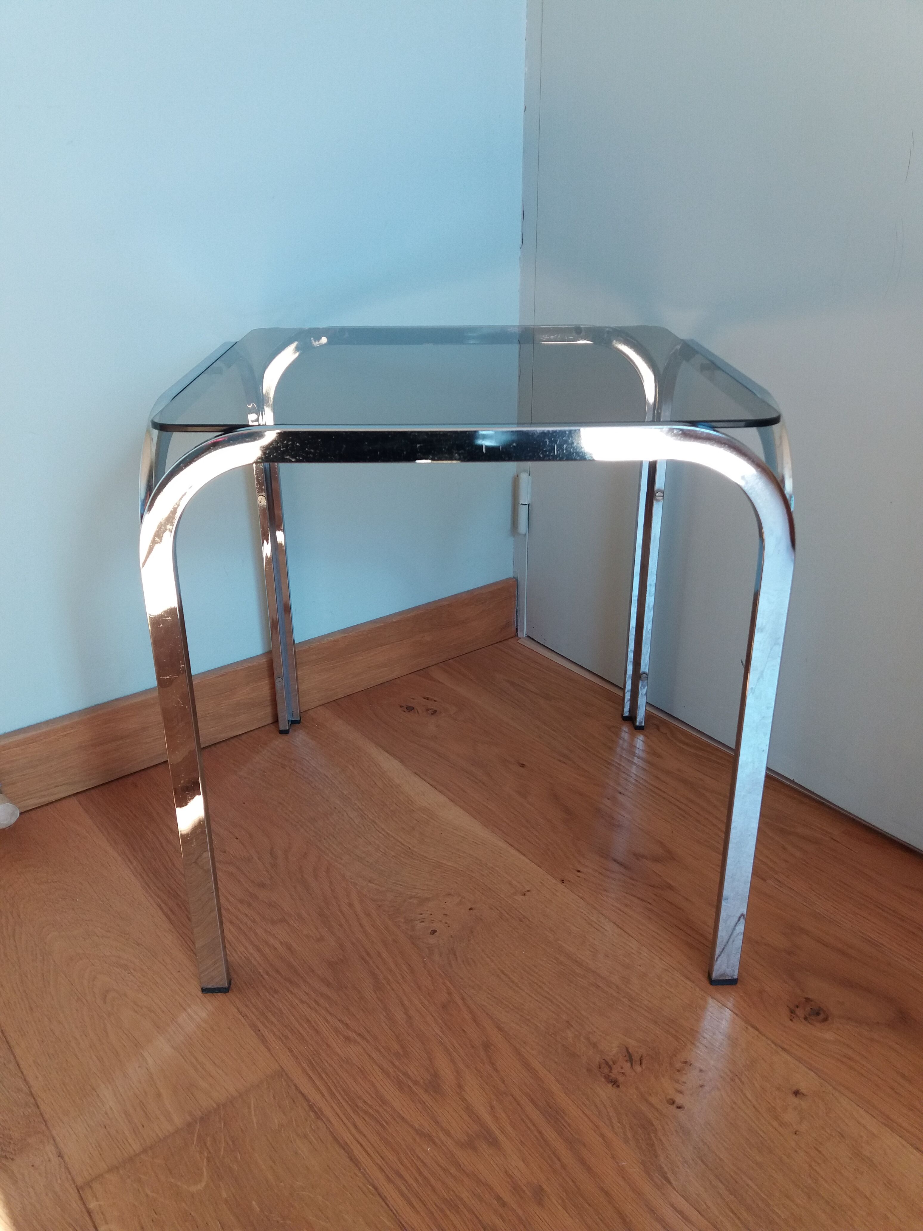 Square coffee table in chromed metal and smoked glass