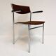 Set of 6 stackable chairs in rust colour by Gijs van der Sluis, 1970s.