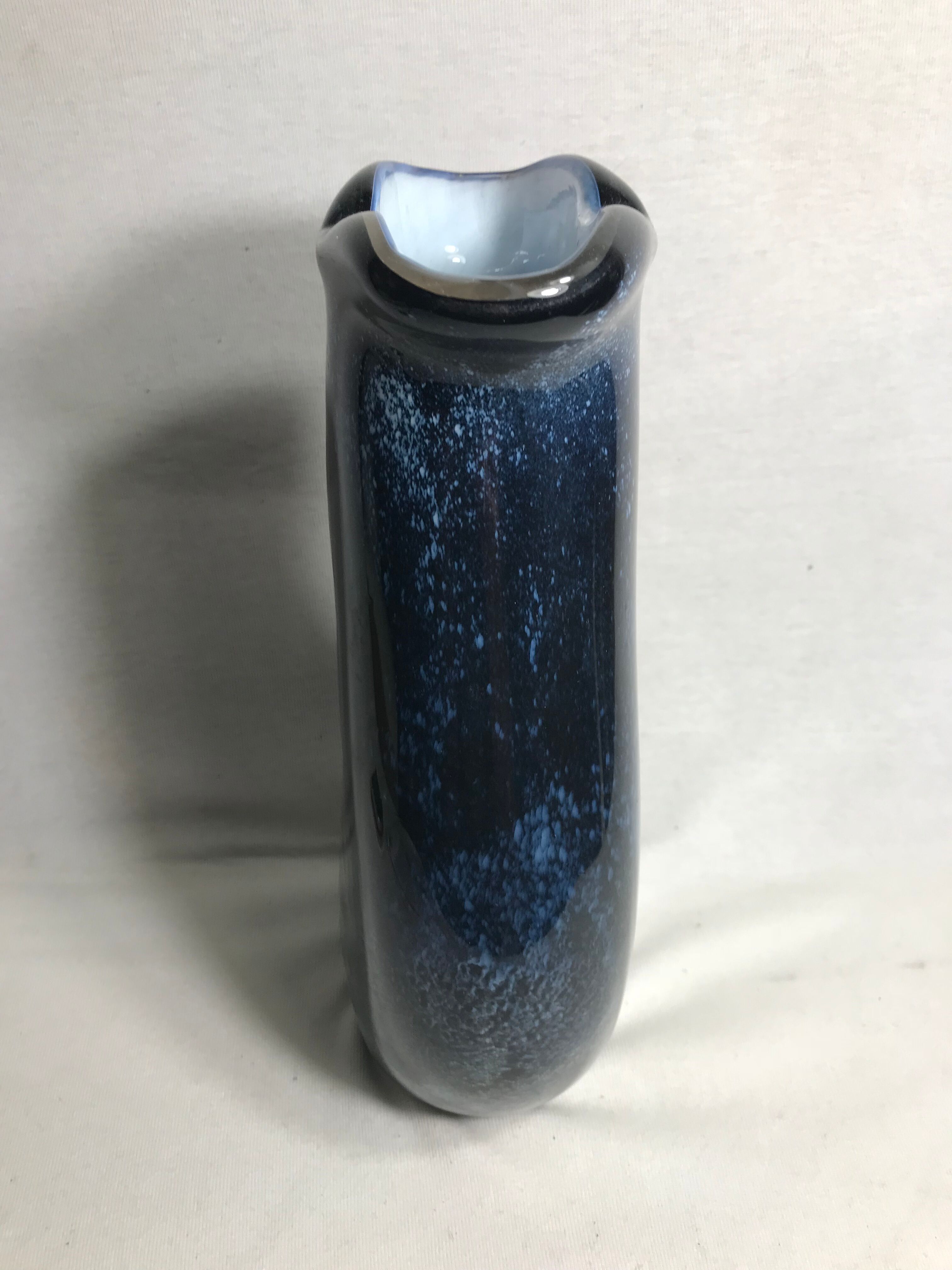 Old glass vase multilayer blue, white vintage interior