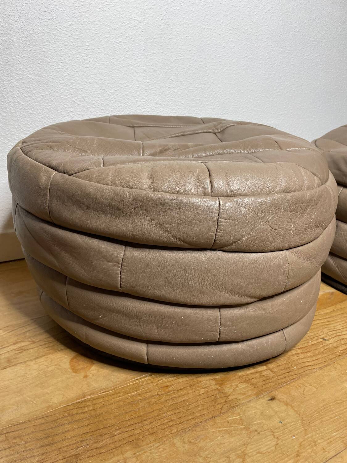 Pair of De Sède patchwork leather poufs