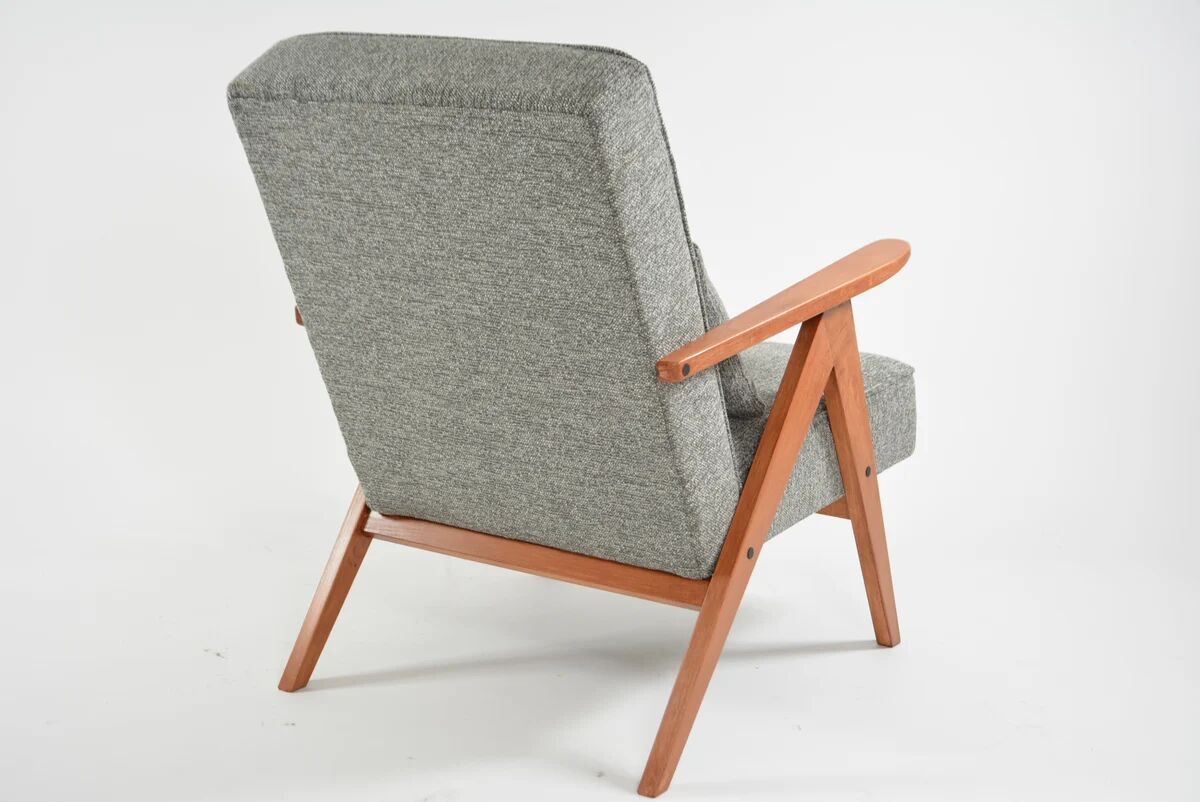 KOMPAS armchairs in grey and white.