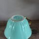 Green and gold cup from the Moi Salins collection.