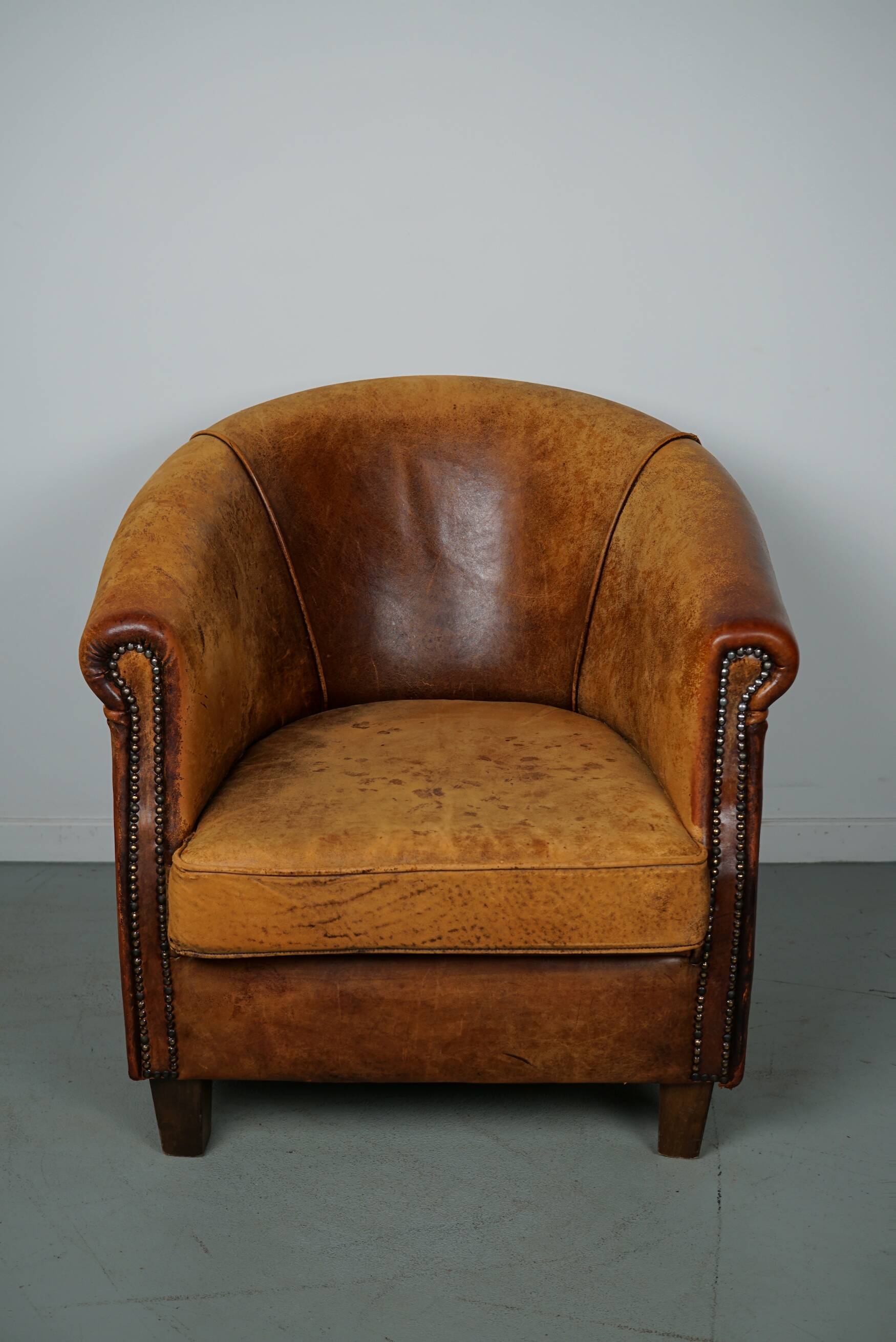 Vintage dutch cognac colored leather club chair