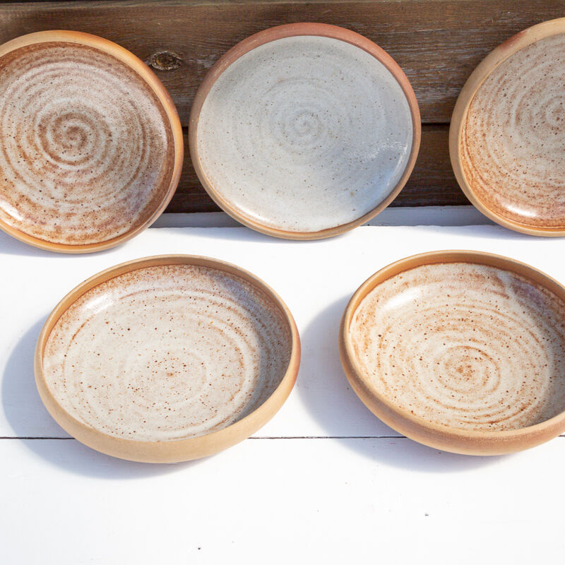 5 hollow stoneware plates Roger Jacques Saint Amand