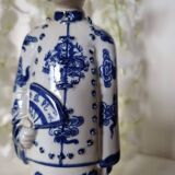 Pair of vintage Chinese blue and white porcelain figurines depicting