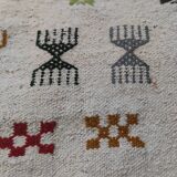 White carpet with multicolored Berber patterns handmade