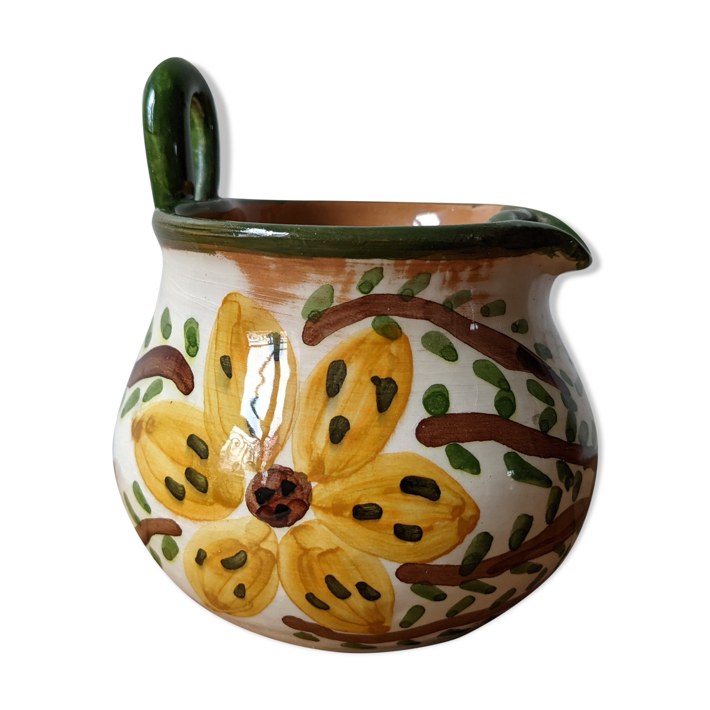 Yellow and green flowery milk pot
