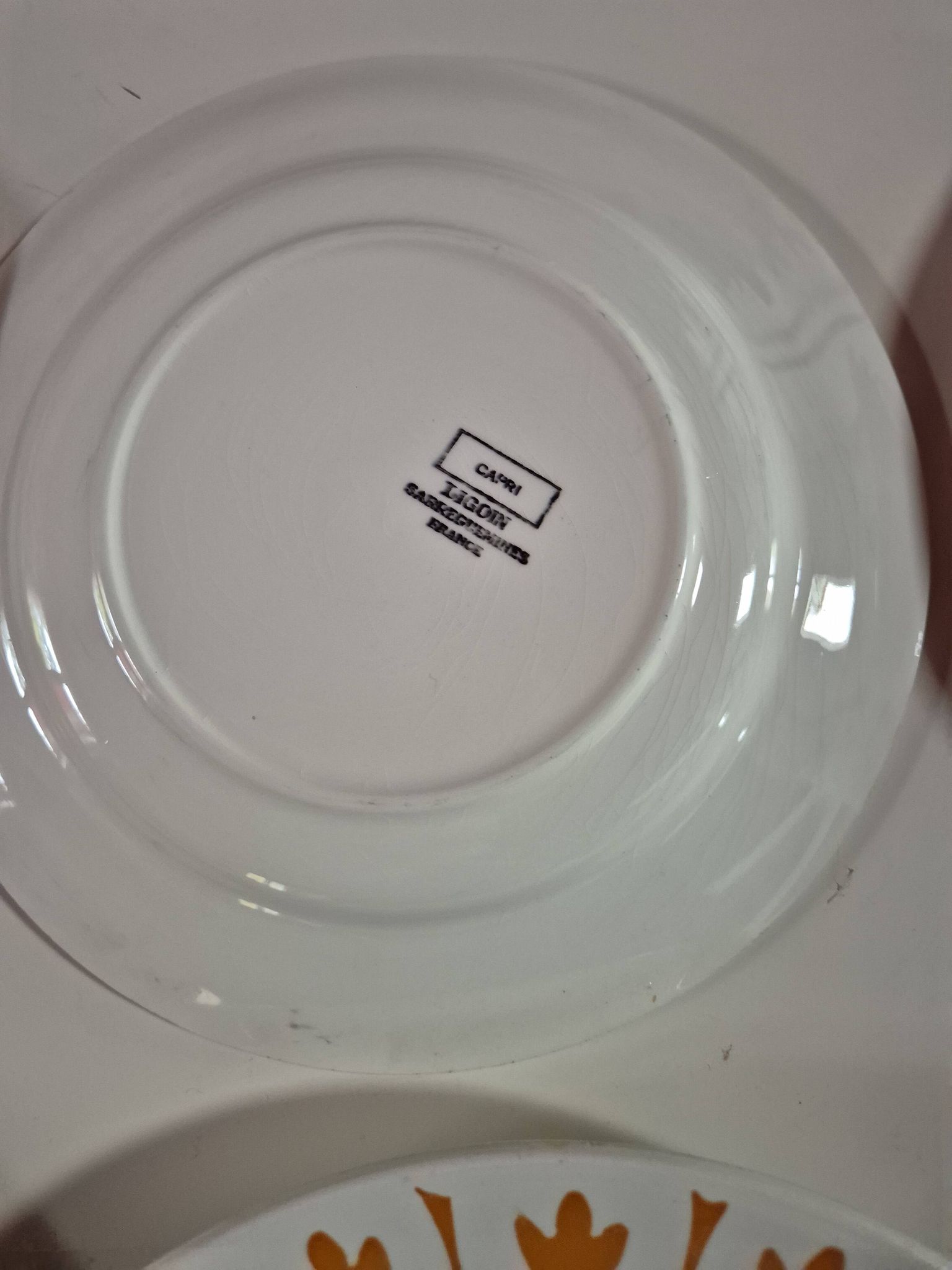 Set of 17 vintage Sarreguemines plates – Capri Ligoin model – orange