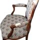 Louis XV cabriolet armchair upholstered in floral fabric