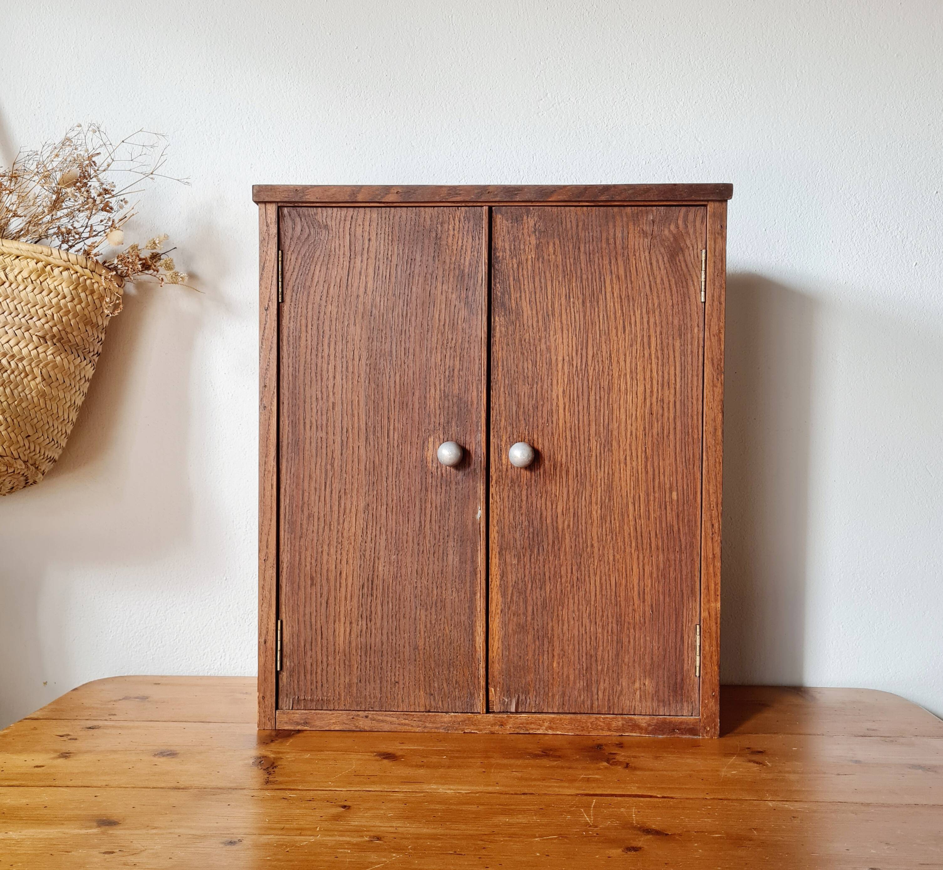Vintage wooden medicine cabinet from the 1950s.