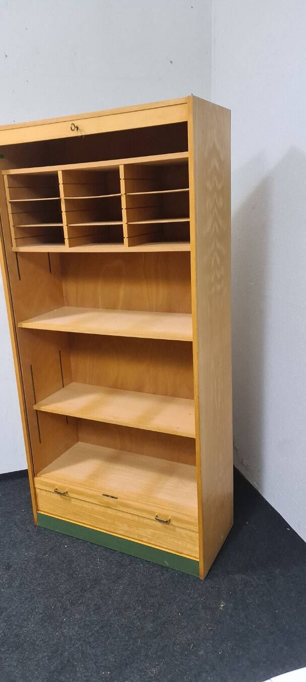 Vintage roll front cabinet by Wini