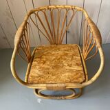 Pair of leather and bamboo armchairs