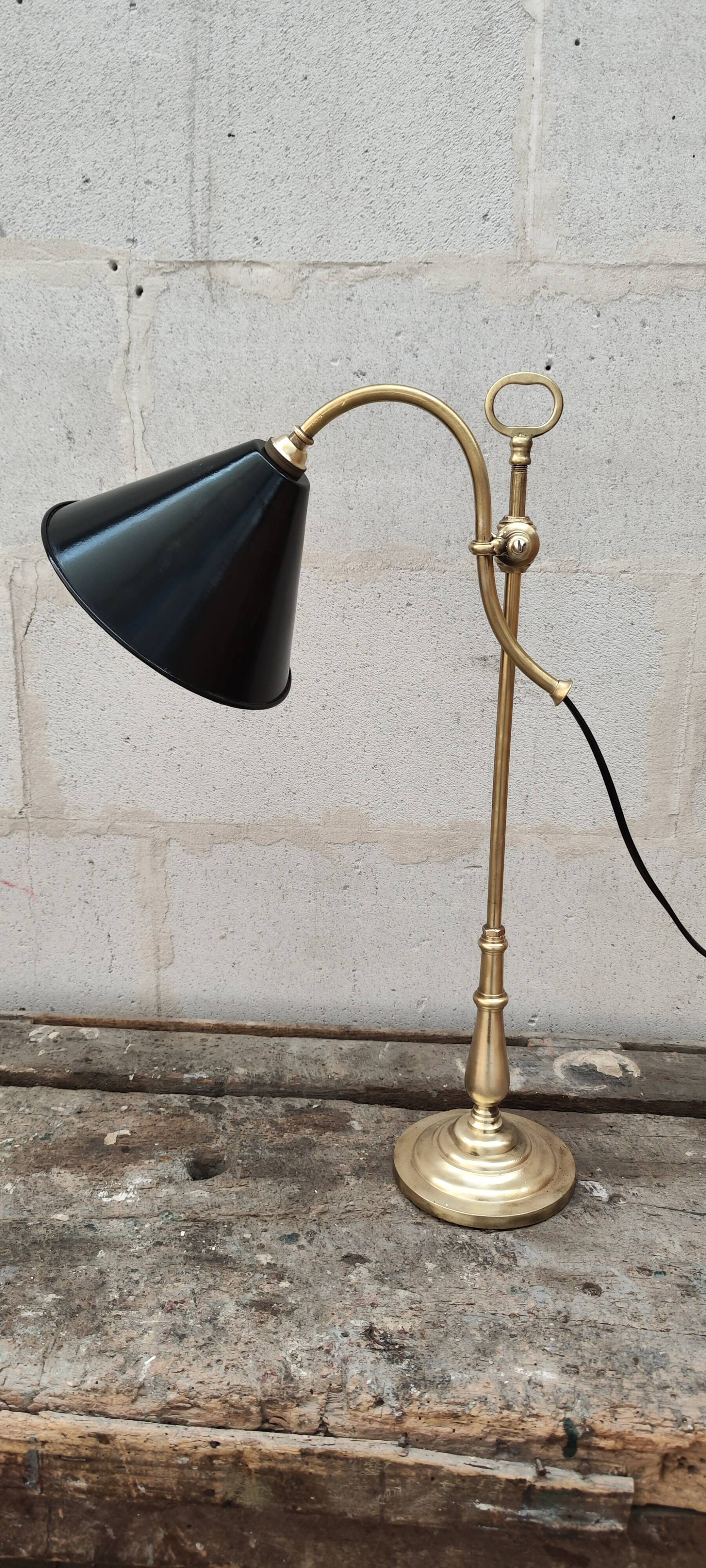 Old lamp in gilded bronze and brass with black enamel lampshade