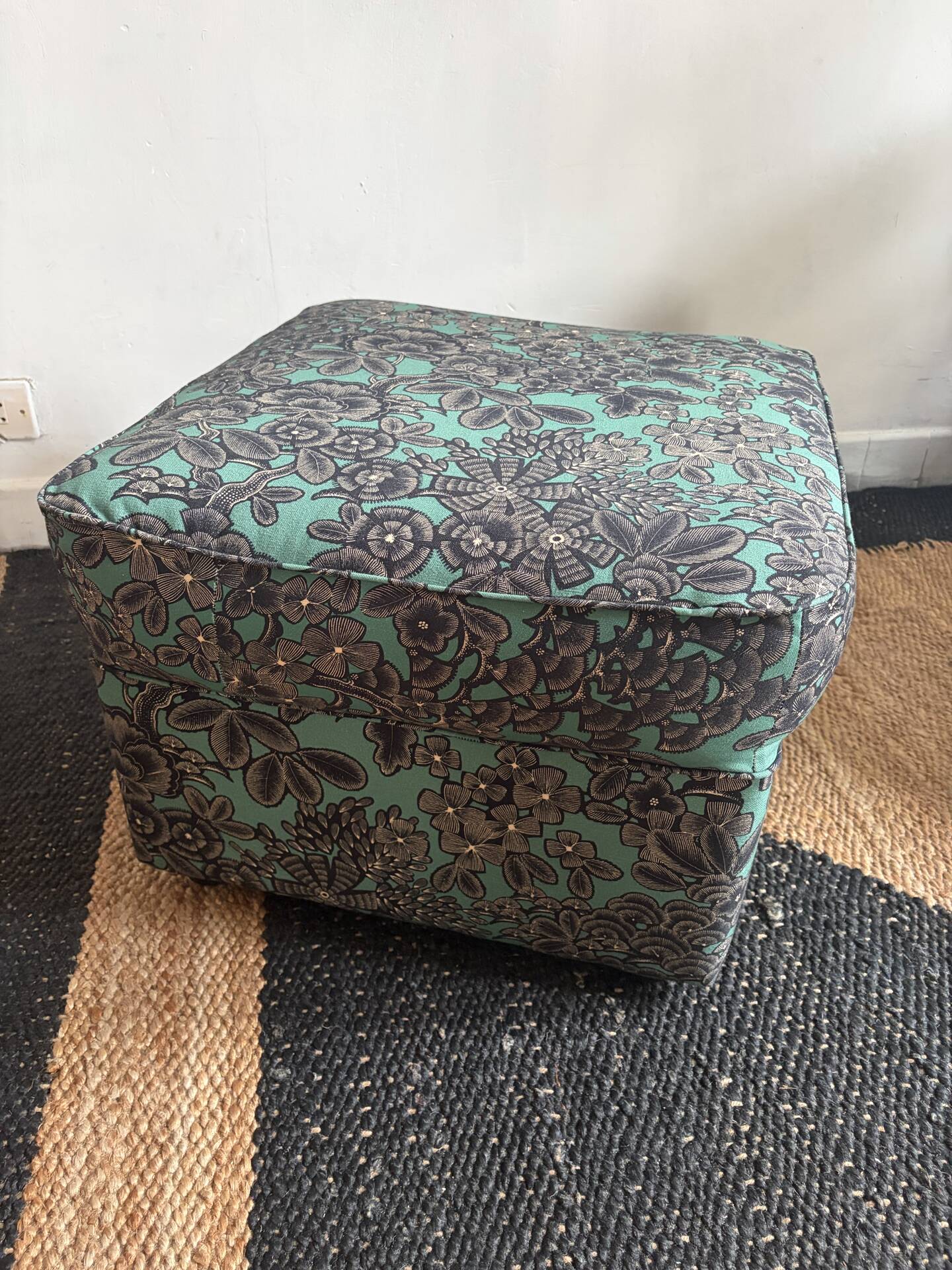 Upholstered pouffe