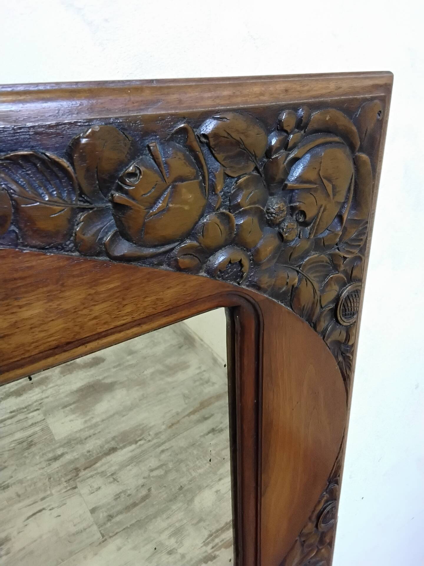 Art Deco mirror with a wooden frame