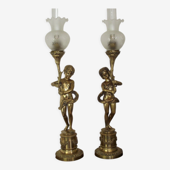 Pair late 19th century brass cherub lamps