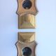 Paire de bougeoirs colonnes en laiton et bronze
