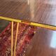 Vintage 1960s rolling dessert trolley in gold metal and formica.