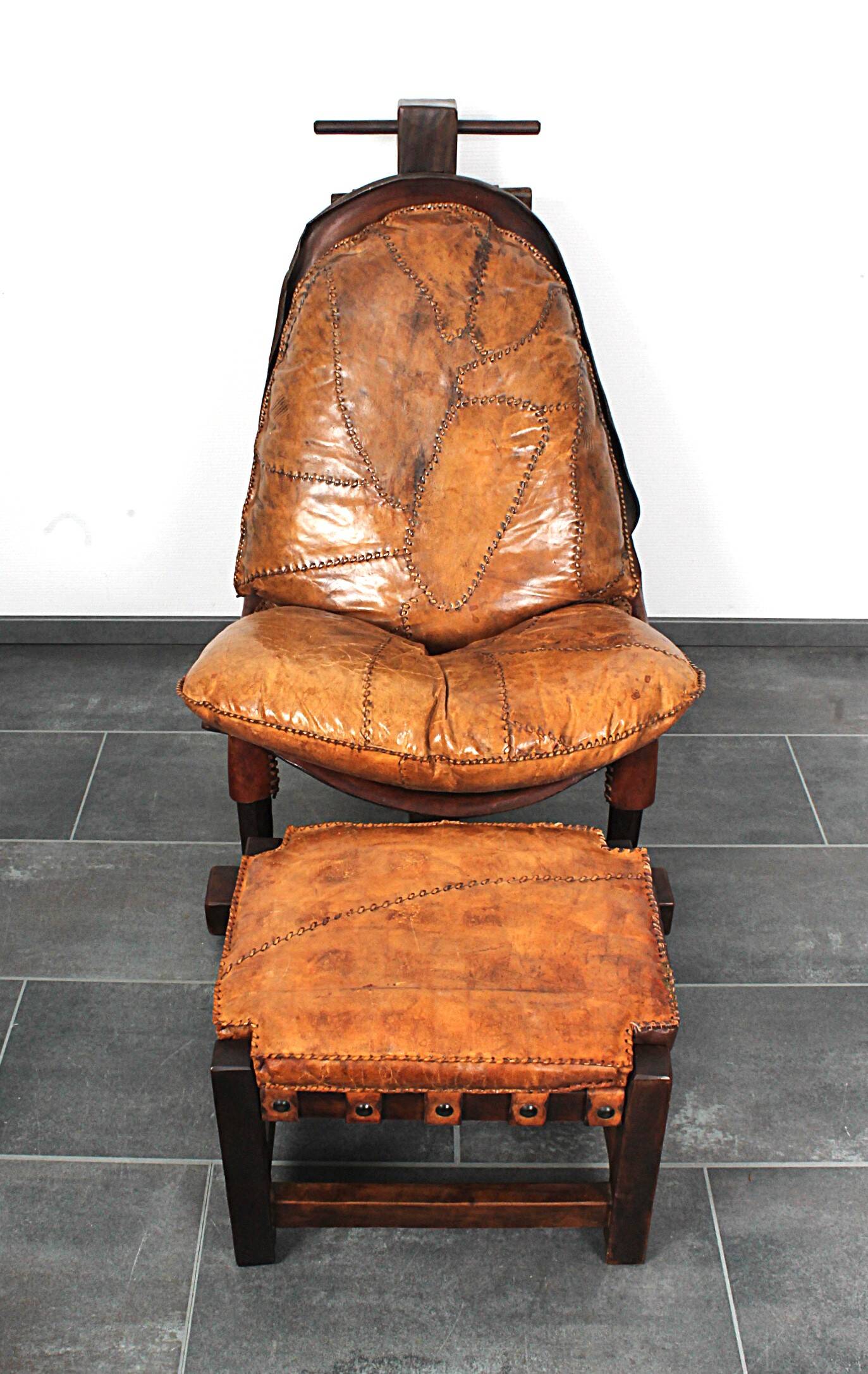 Brutalist oak lounge chair and ottoman, 1970s, set of 2