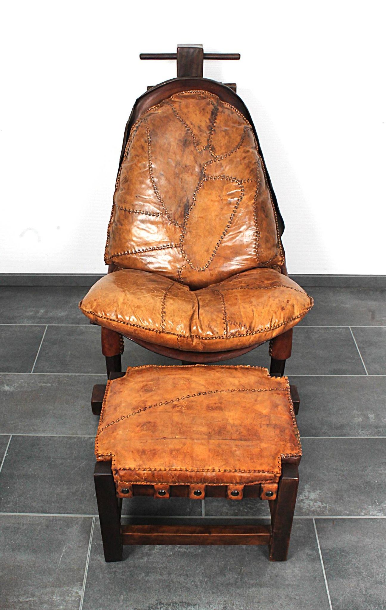 Brutalist oak lounge chair and ottoman, 1970s, set of 2