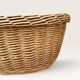 Woven blonde wicker basket