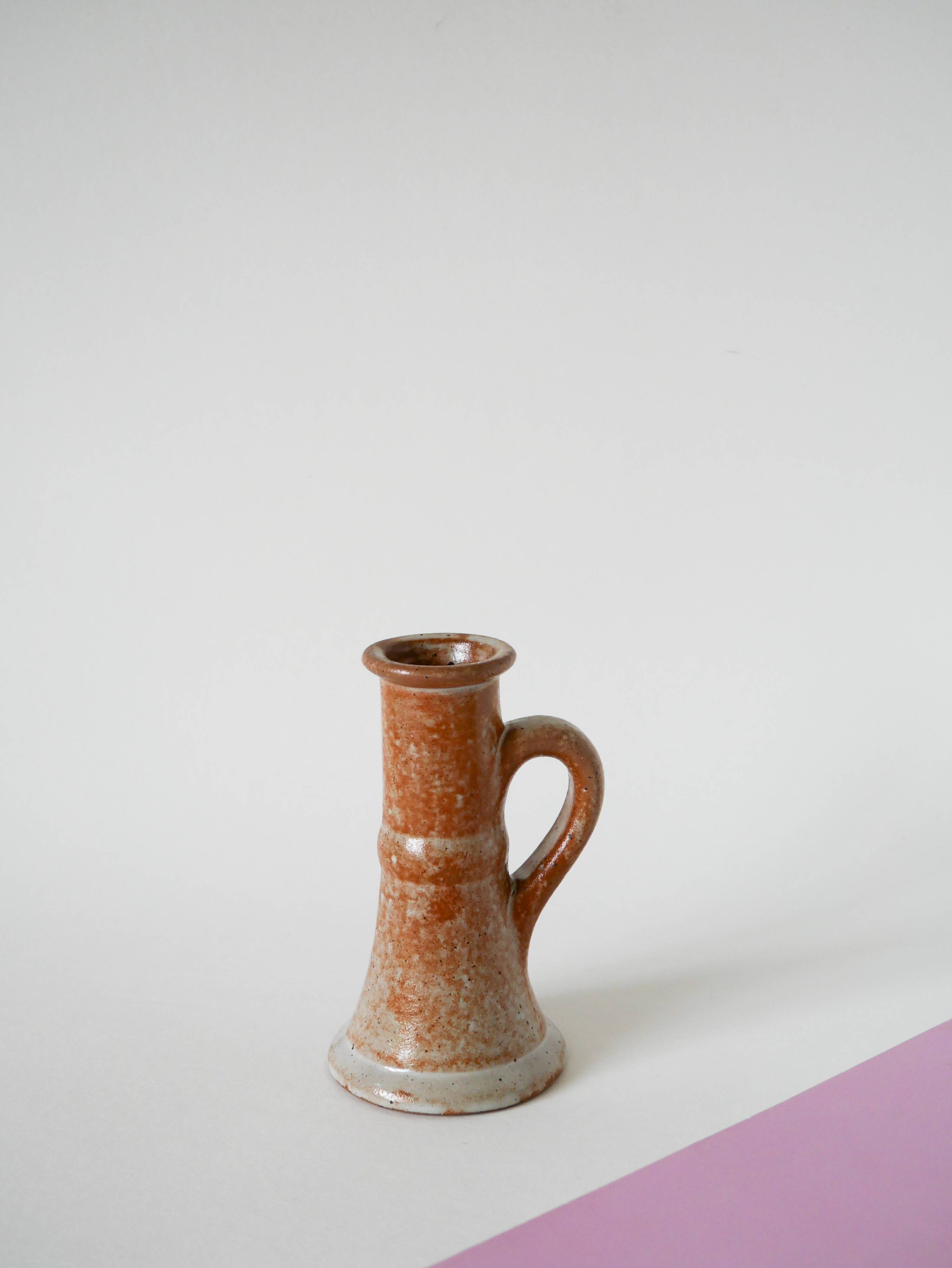Pair of glazed sandstone candlesticks, 1970