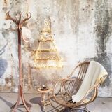 Antique swivel rattan armchair