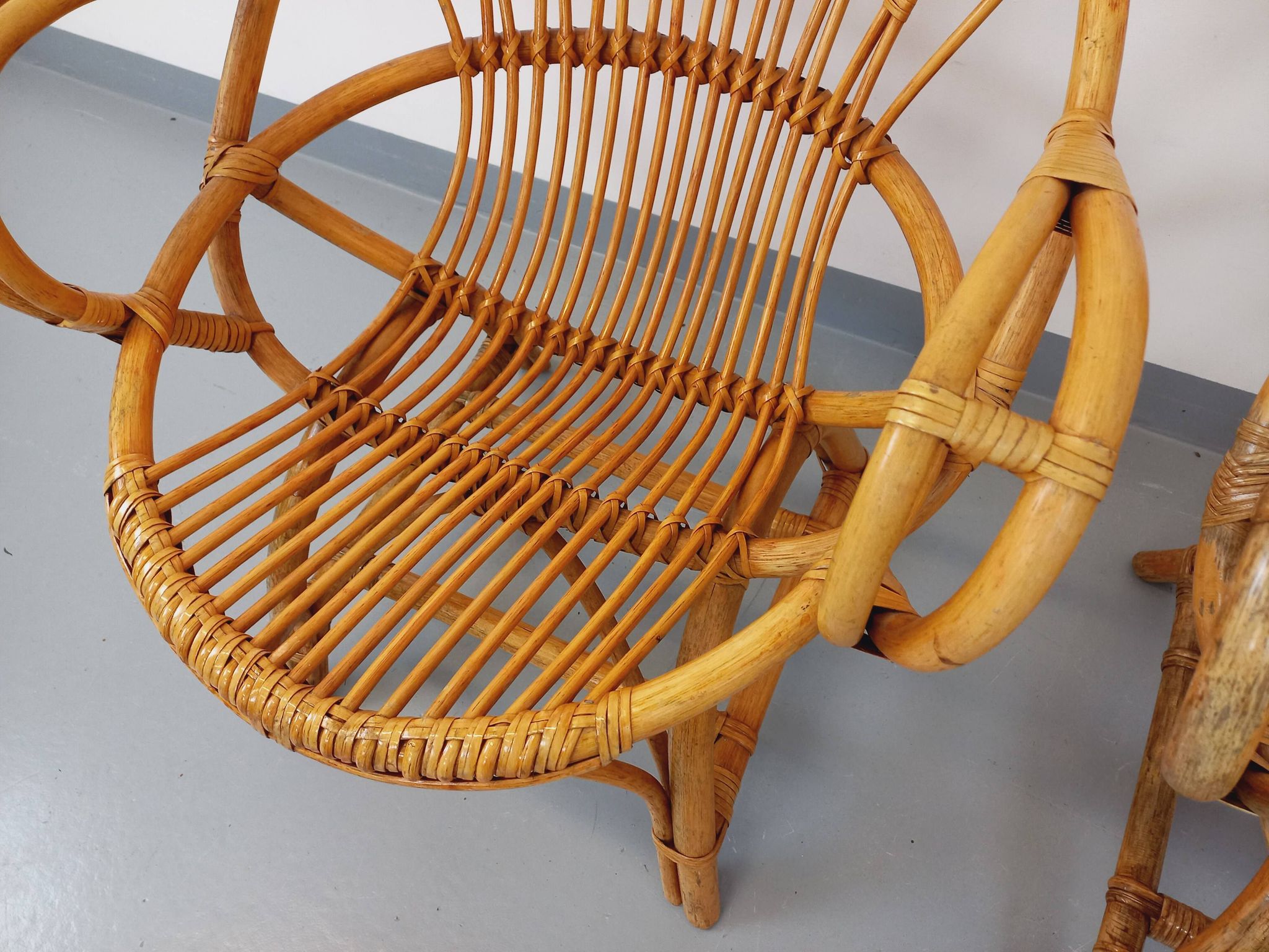 Pair of vintage rattan armchairs from the 60s