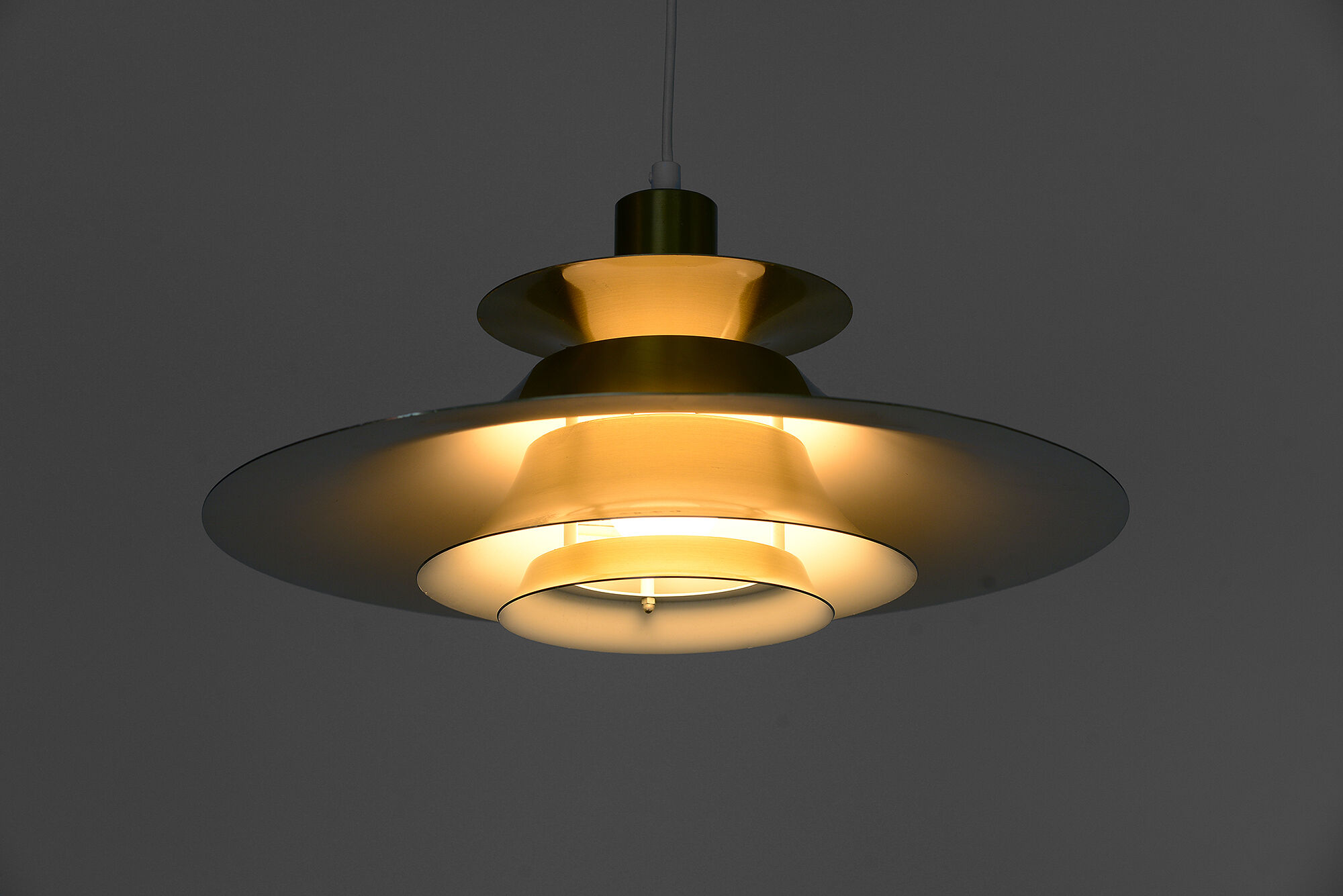 Brass colored aluminium pendant light Typ 1033-P by Benny Frandsen for Frandsen A/S. Denmark 1970s.