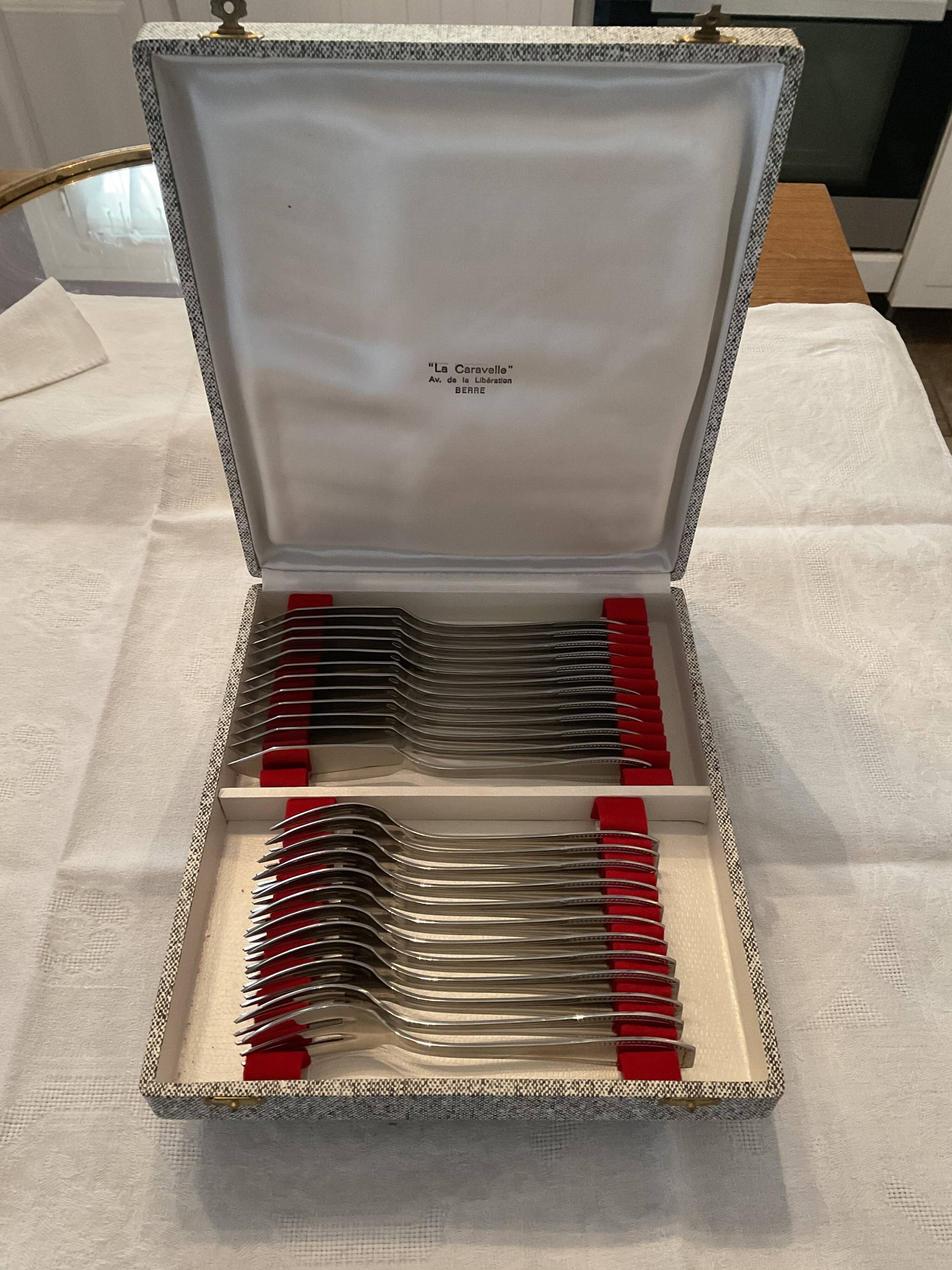 24 fish covers. Forks and knives . Stainless steel. Vintage