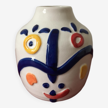 White porcelain vase created by Juan di Novita. Hand painted designs.