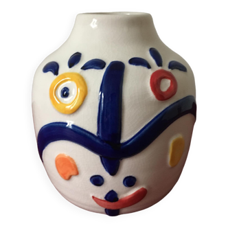 White porcelain vase created by Juan di Novita. Hand painted designs.