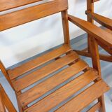 Vintage garden furniture set consisting of a table with extensions and 4 armchairs