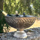 Large silver plated champagne cooler bowl on pedestal with grape