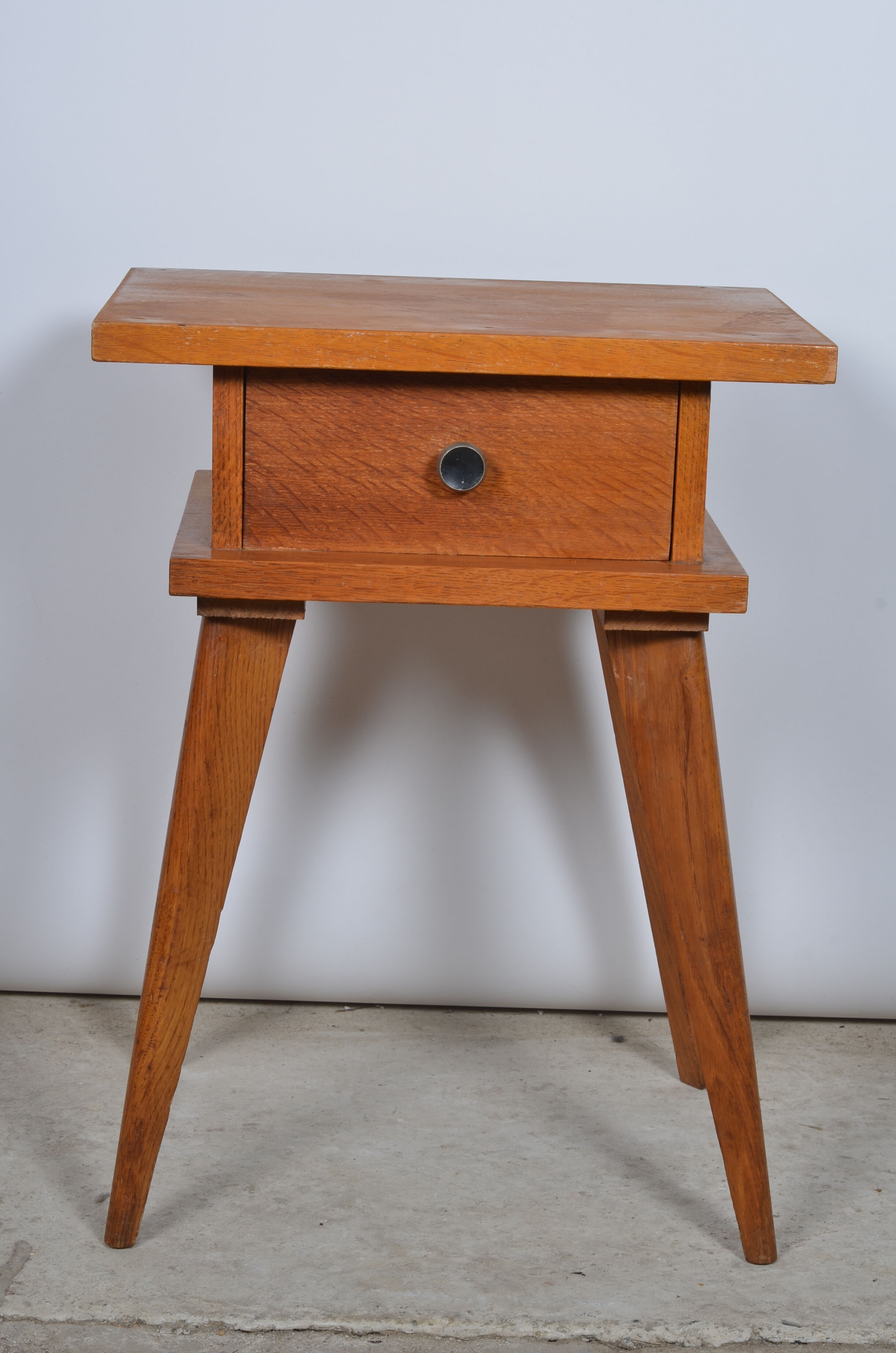 Compass feet bedside table