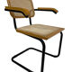 Cesca model chair designed by Marcel Breuer with black-framed armrests