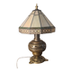 brass and bronze lamp with an antique base from 1900 and a glass paste shade