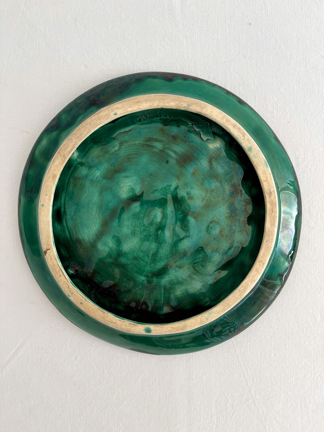 Round plate, green acanthus leaf barbotine, vintage.
