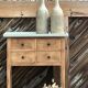Raw wood console in water green with 4 drawers.