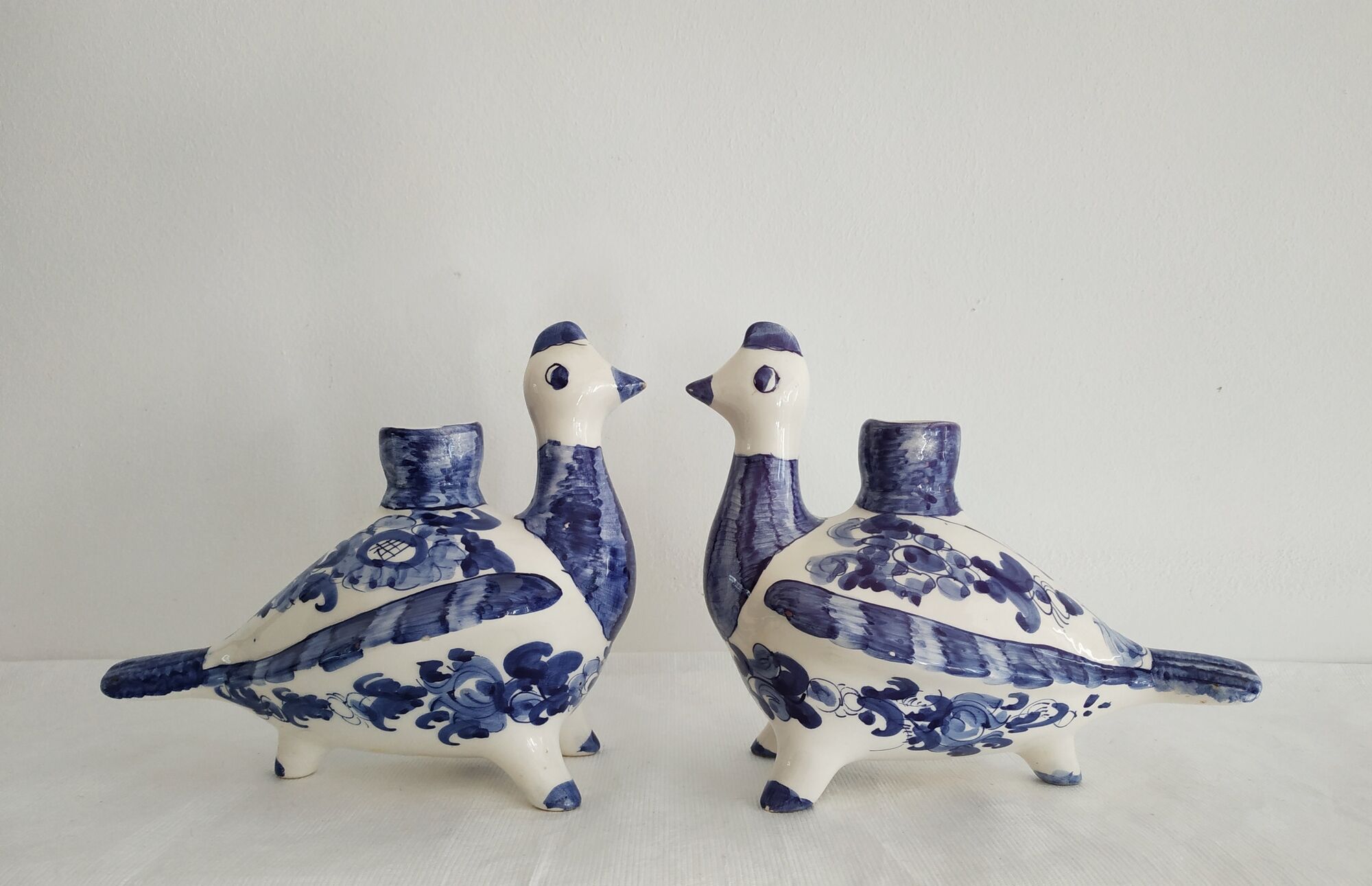 Pair of bird candlesticks in blue white, Skyros earthenware