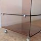 Pair of vintage smoked plexiglass bedside tables or accent furniture.