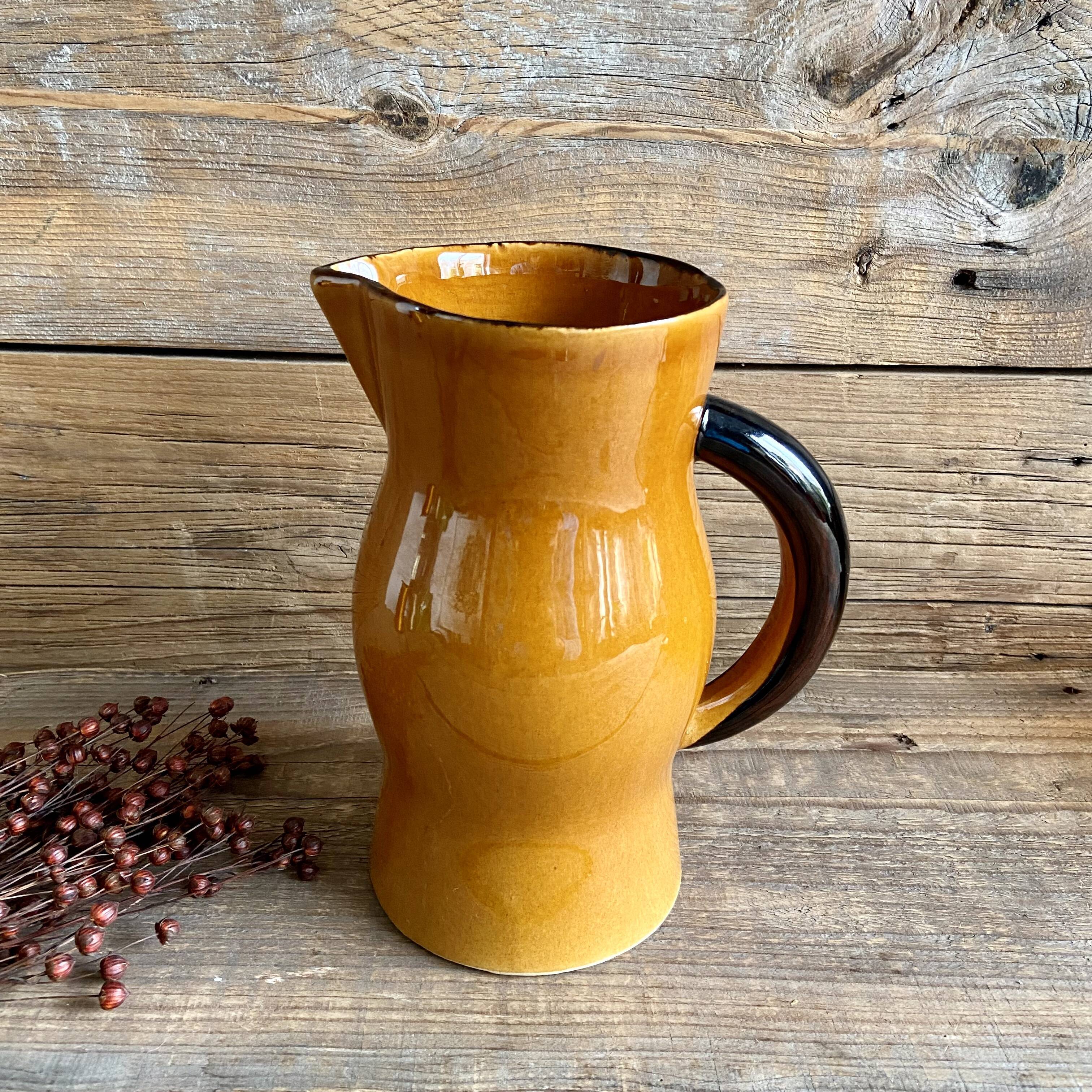 Vintage glazed ceramic pitcher