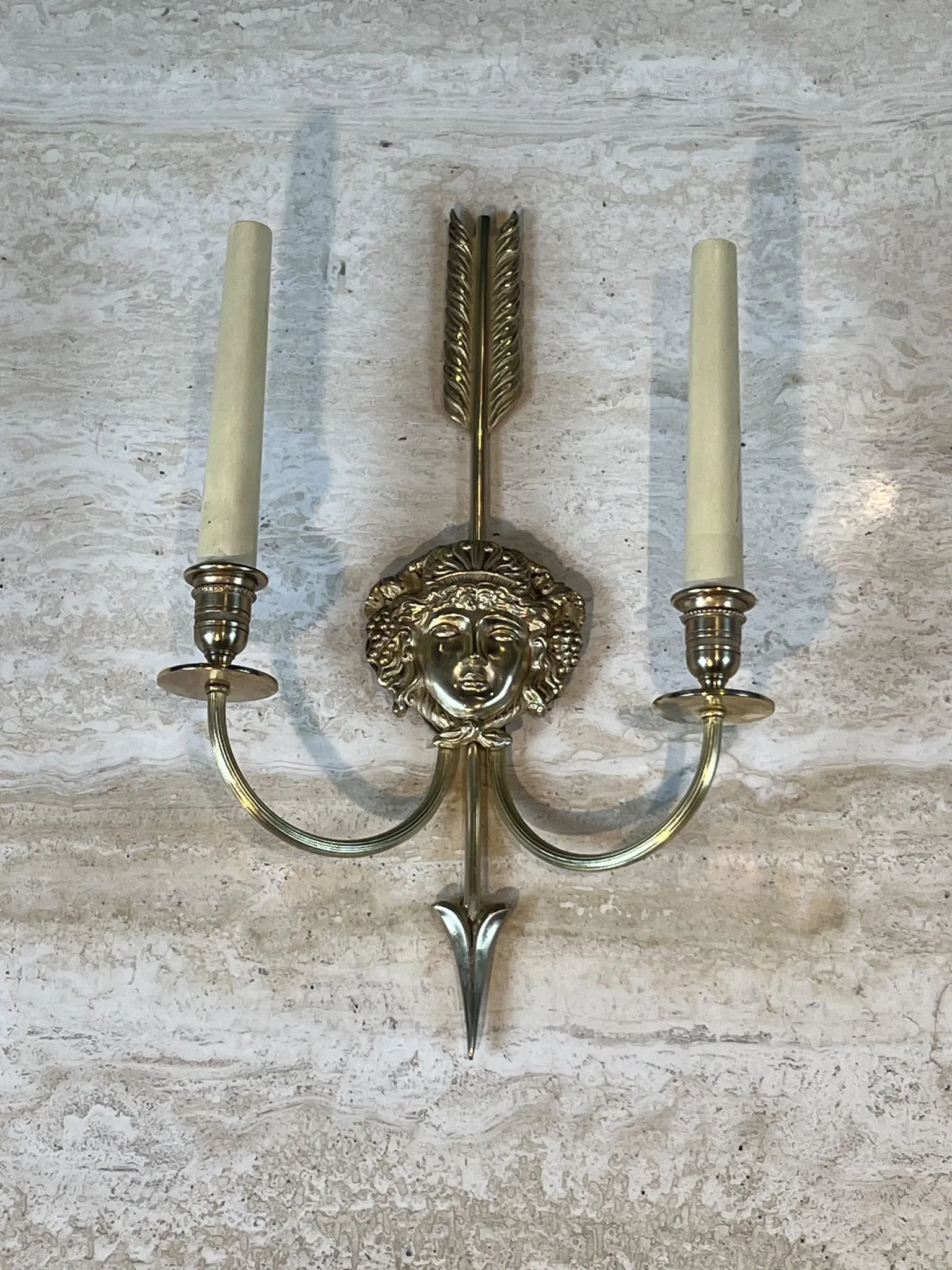 Pair of Two-Arm Bronze Wall Lights with Arrow and Mask Decoration