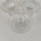 12 coupes à champagne en cristal de baccarat, XIX ème siècle.