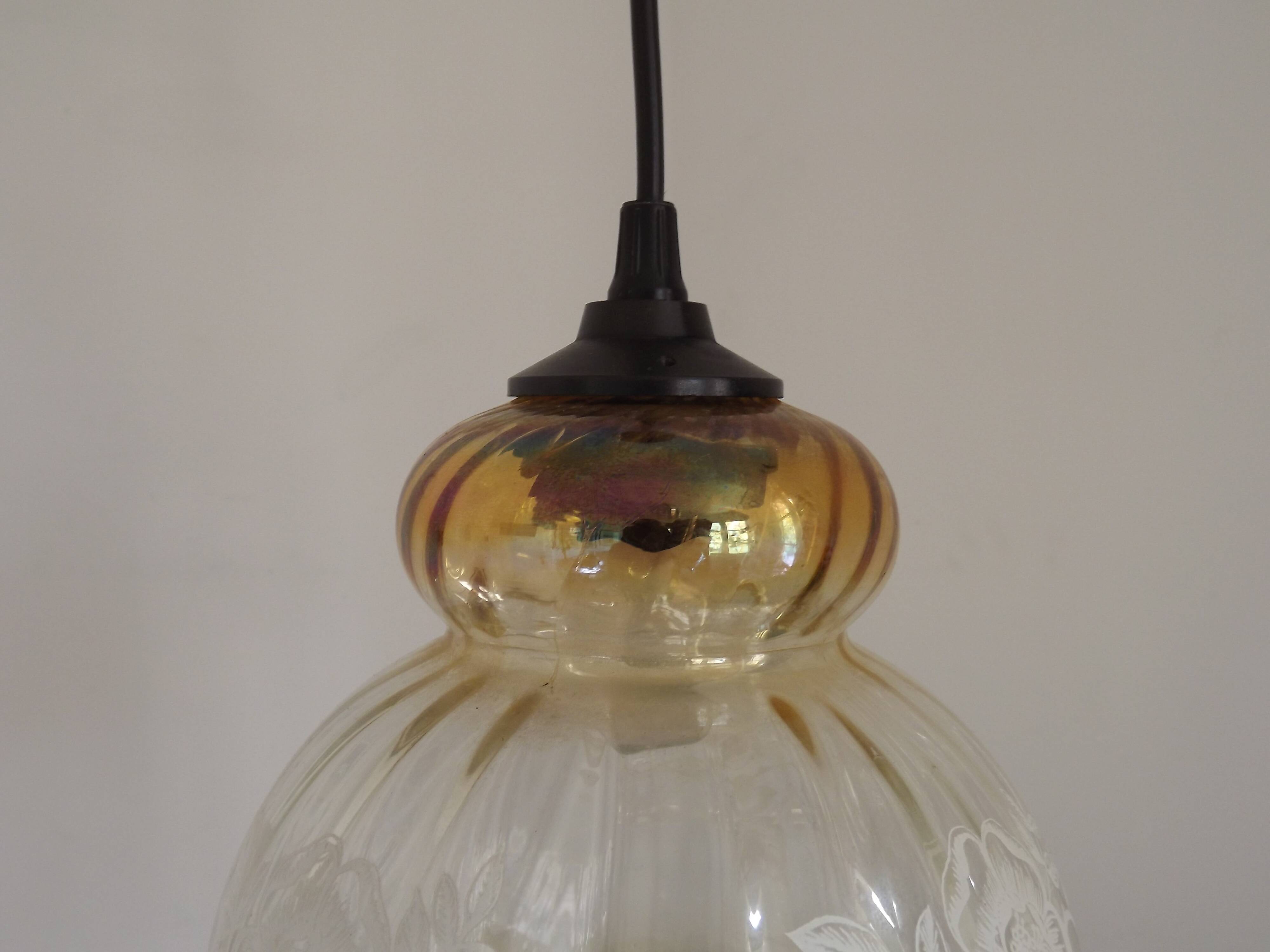 French vintage amber and clear glass ceiling light with white floral decoration.